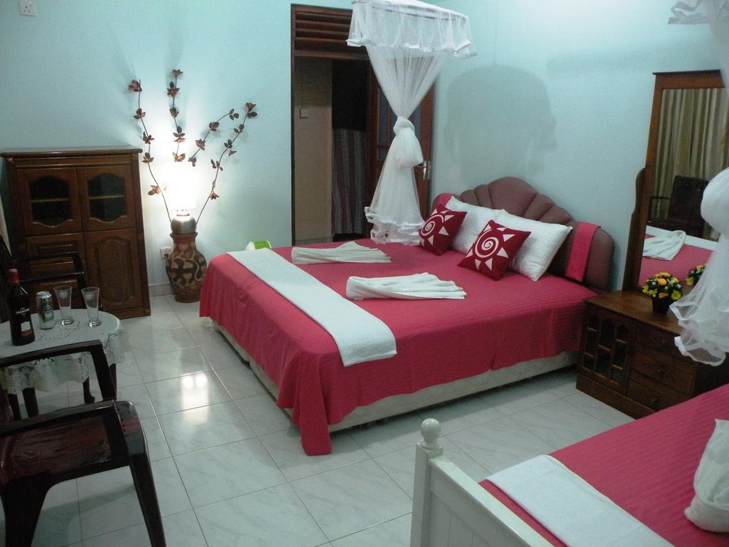 Henderson Airport Residence Negombo Chambre photo